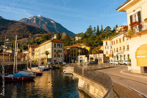 Menaggio , port , beautiful town at Lake Como , Lombardy . during autumn , winter sunny day : Lake Como , Italy : December 7 , 2019