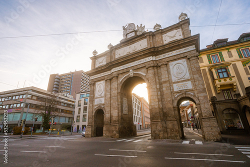 Triumphpforte or Triumphal Arch , the main gate on Maria Theresien Street in old town of Innsbruck during winter : Innsbruck , Austria : December 8 , 2019