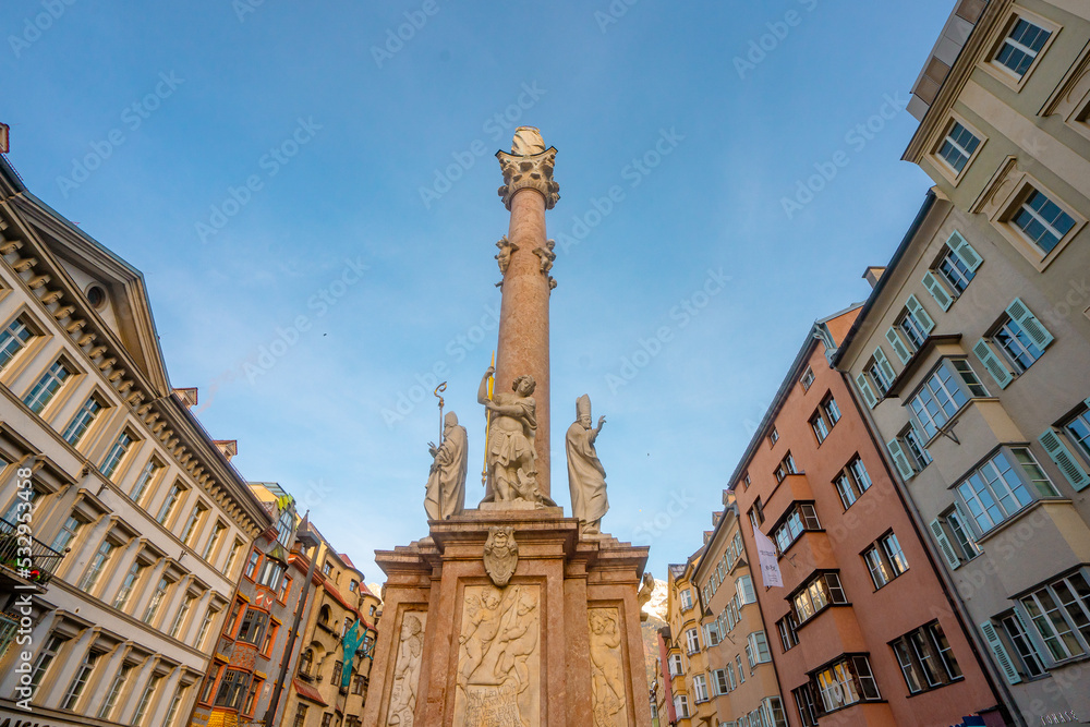 Annasaule column at Maria Theresien Strasse  in old town of Innsbruck during autumn , winter sunny day : Innsbruck , Austria : December 8 , 2019