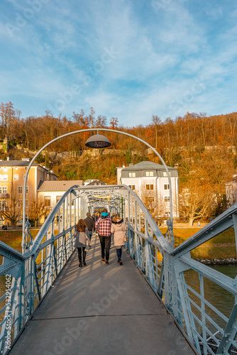 Panoramic ,Mozartsteg and buildings along Salzach river near Marko Feingold Steg during autumn , winter  : Salzburg , Austria : December 9 , 2019 photo