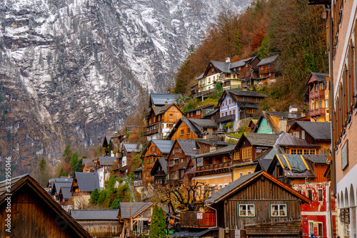 Panoramic classic view at Hallstatt , Unesco Romance town at Lake Hallstatt and Salzkammergut  during winter cloudy day : Hallstatt , Austria : December 10 , 2019