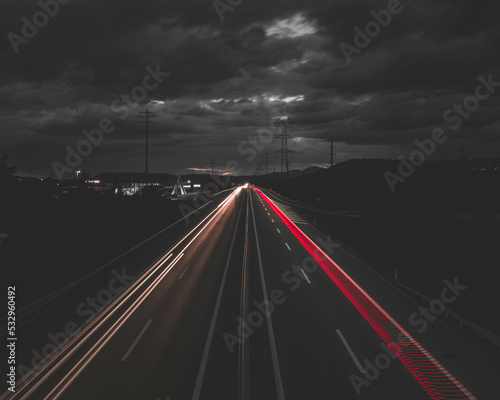 long exposure highway lights and cloud