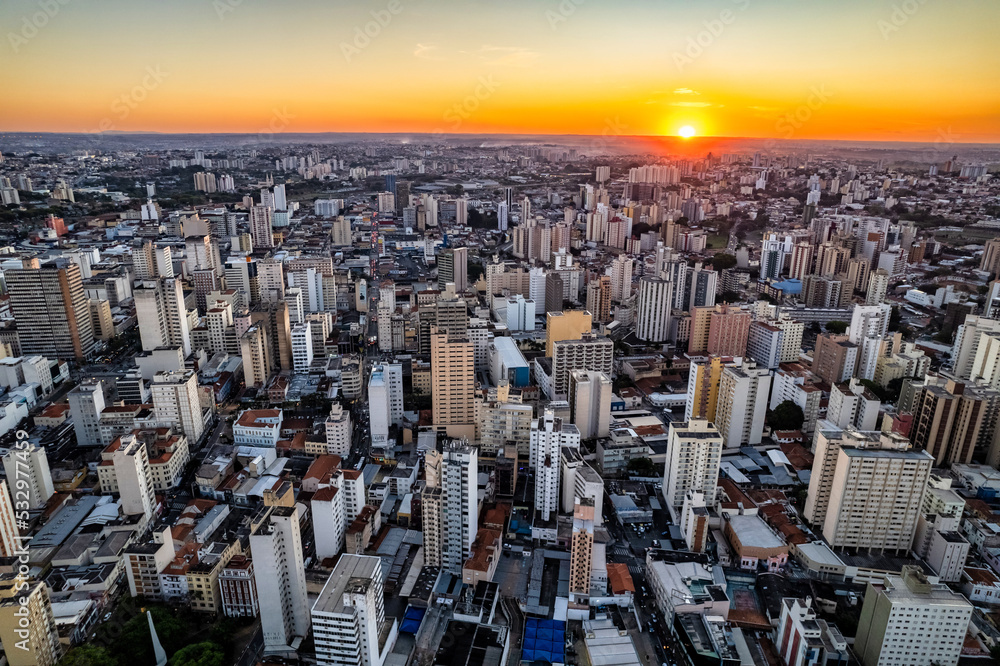 Fototapeta premium Central region of the City of Campinas with buildings, avenues and cars in the early evening. Francisco Glicério Avenue, Orosimbo Maia Avenue and City Hall area.