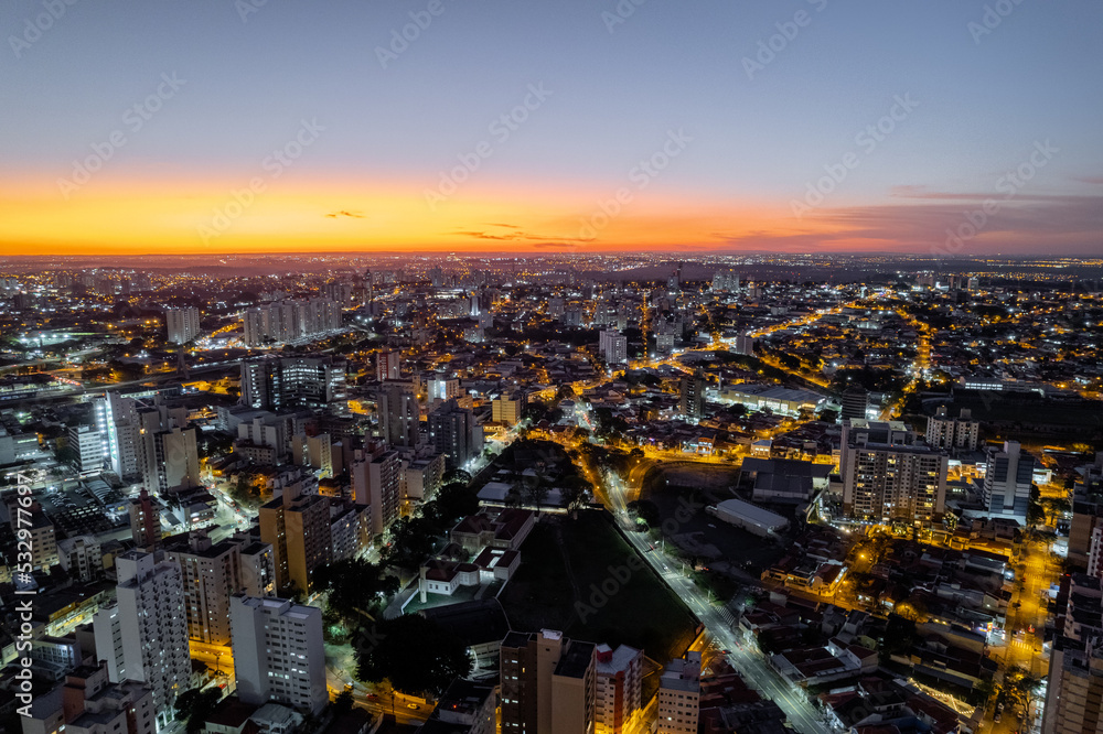 Central region of the City of Campinas with buildings, avenues and cars in the early evening. Francisco Glicério Avenue, Orosimbo Maia Avenue and City Hall area.