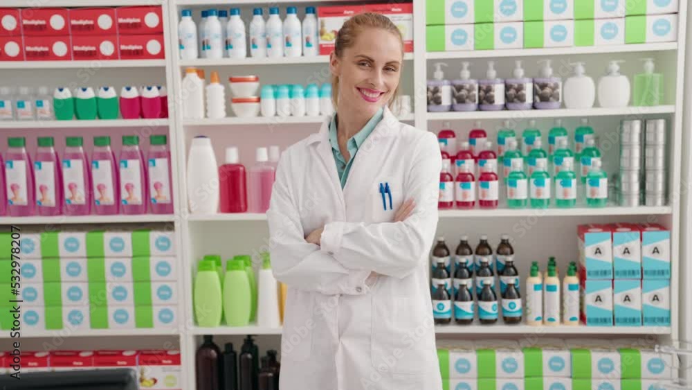 Young beautiful hispanic woman pharmacist smiling confident standing with arms crossed gesture at pharmacy Young beautiful hispanic woman pharmacist smiling confident standing with arms crossed gesture at pharmacy