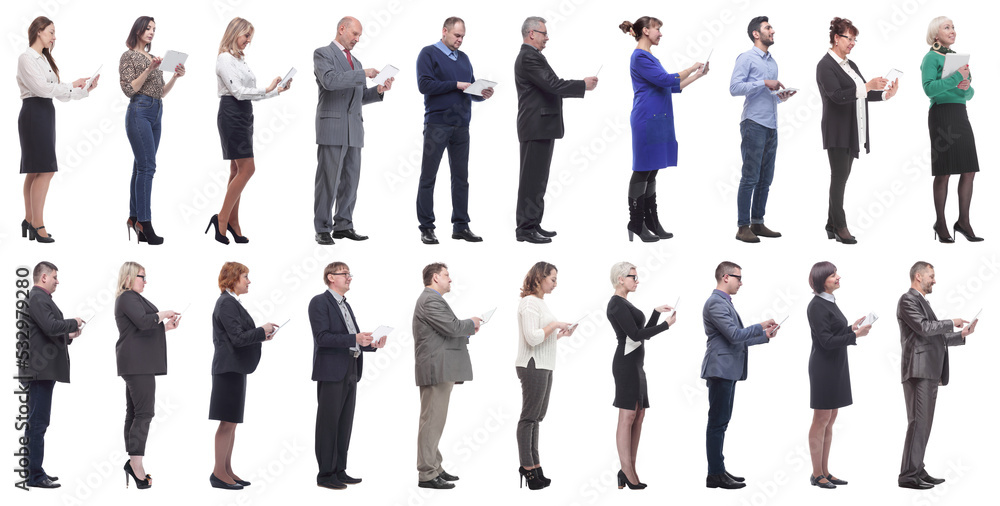 group of people holding tablet and looking ahead