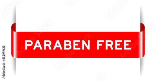 Red color inserted label banner with word paraben free on white background photo