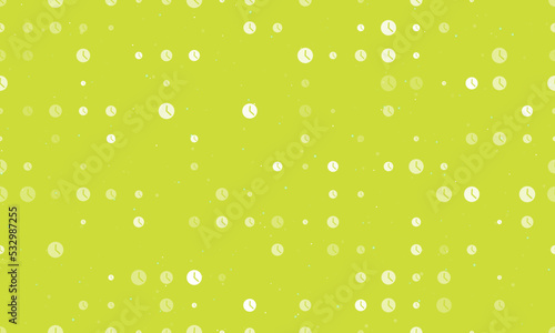Seamless background pattern of evenly spaced white time symbols of different sizes and opacity. Vector illustration on lime background with stars photo