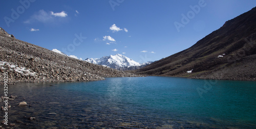Beautiful lake in Pamir mountains. Trekking area. photo