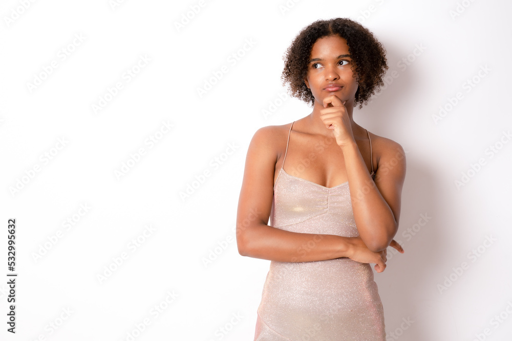 I Think. Dreamy african woman looking up, touching her chin with finger, isolated over white studio wall, copy space I Think. Dreamy african woman looking up, touching her chin with finger, isolated over white studio wall, copy space