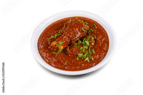Bhuna Gosht Mutton masala OR Indian Lamb Curry Served in a bowl over white background. Selective focus