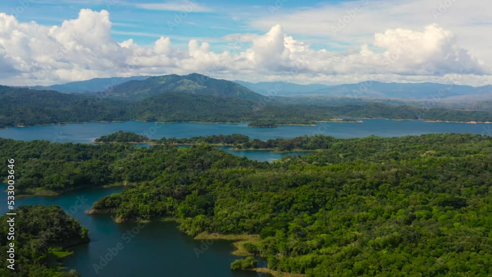 Beautiful landscape with green hills, top view. Azure Pantabangan lake among the hills. Lake in the mountains. Philippines, Luzon. Beautiful landscape with green hills, top view. Azure Pantabangan lake among the hills. Lake in the mountains. Philippines, Luzon.