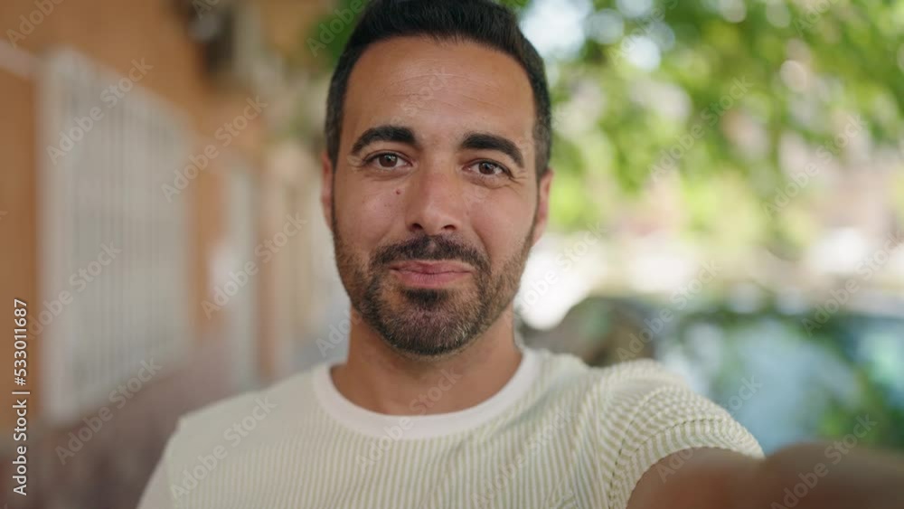 Young hispanic man smiling confident having video call at street Young hispanic man smiling confident having video call at street