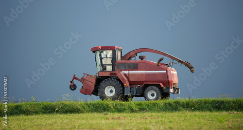 combine harvester isolated on gray background © Юрий Горид