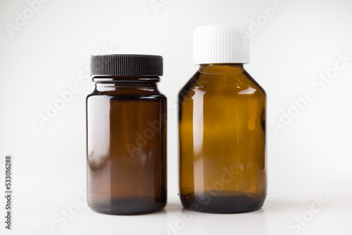 medical jars with dark glass caps