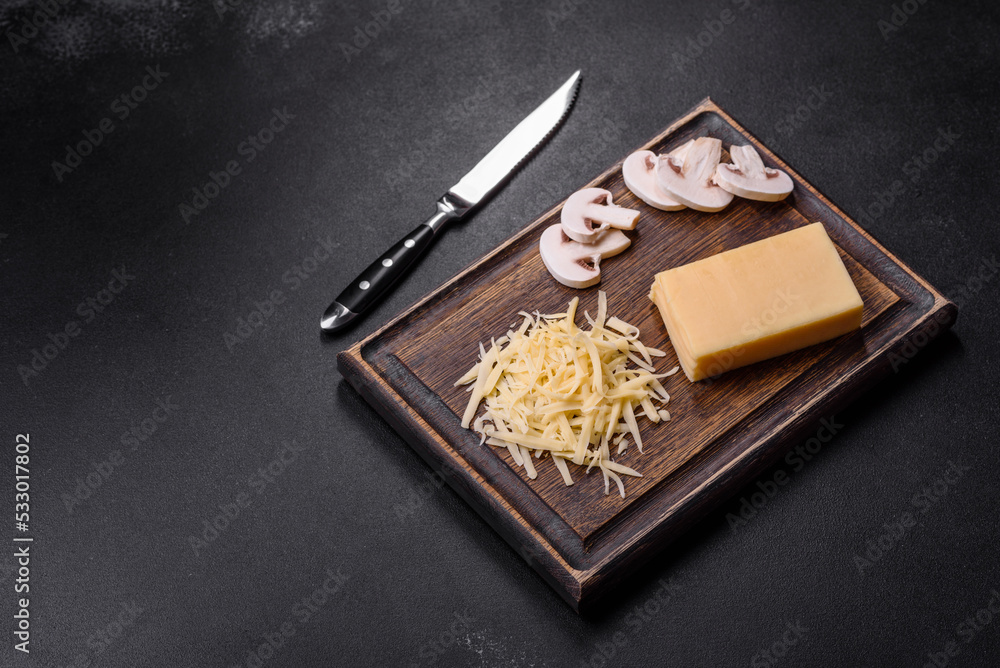 Raw pasta, mushrooms, onions, mince, spices and herbs to make a delicious paste Raw pasta, mushrooms, onions, mince, spices and herbs to make a delicious paste