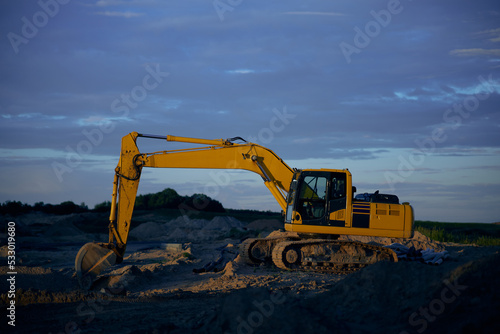 Excavator excavation work. The work of construction equipment in the production of earthworks 