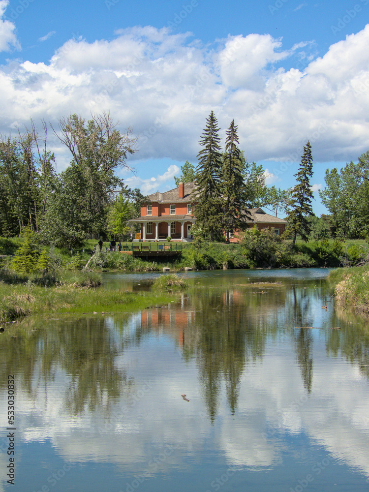 Obraz premium Landscape with river and trees, Inglewood Bird Sanctuary, Calgary, Canada