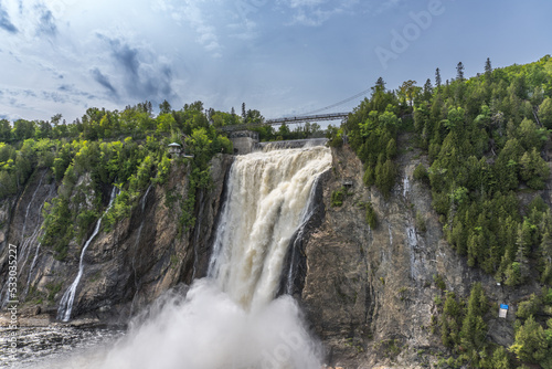 The Montmorency Falls  Chute Montmorency  large waterfall on Montmorency River where it drops into the Saint Lawrence River in Quebec  Canada. Protected within Montmorency Falls Park.