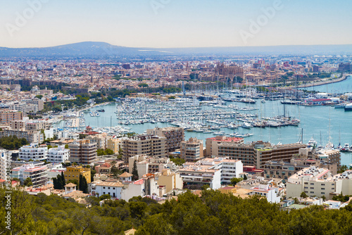 Unique panoramic skyline view of Palma de Mallorca, and marina with yachts. Viewed in the background is La Seu Cathedral. © Stockphototrends