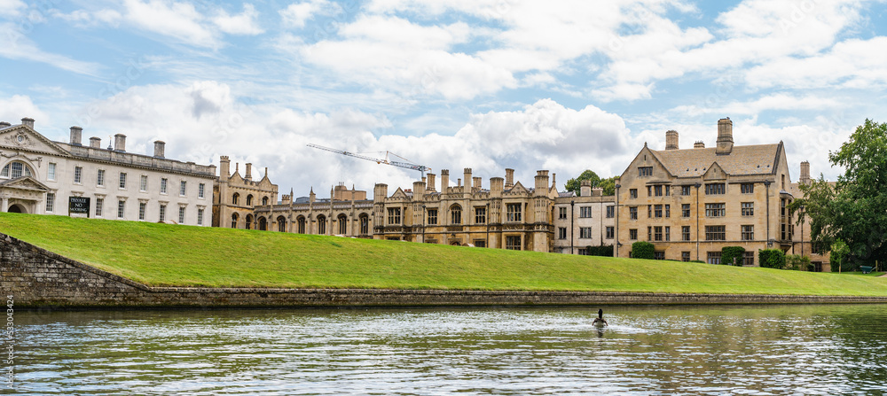 View of the buildings of Cambridge university from punting boat on river, Cambridgeshire, England