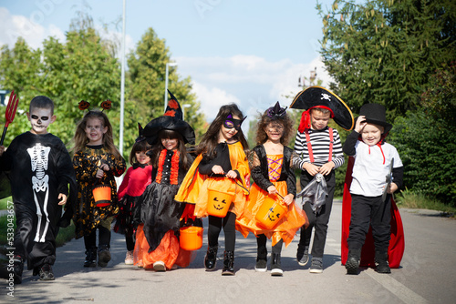 Happy group of kids on Halloween 