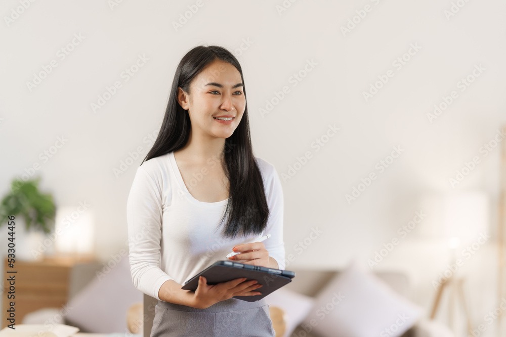 Calm single young asian woman relax at work home office. Calm single young asian woman relax at work home office.