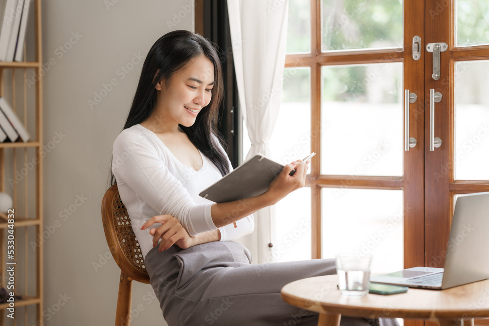 Calm single young asian woman relax at work home office.