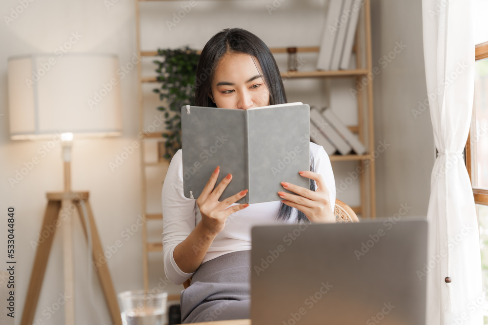 Calm single young asian woman relax at work home office. Calm single young asian woman relax at work home office.