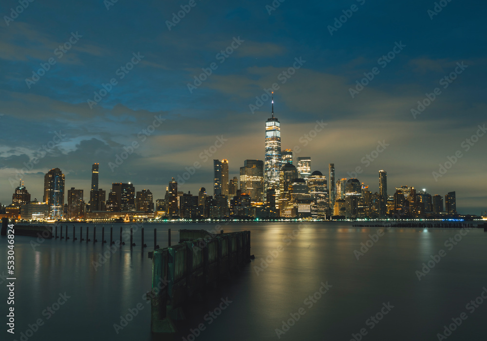 city skyline Manhattan.sky clouds lights water river New York  