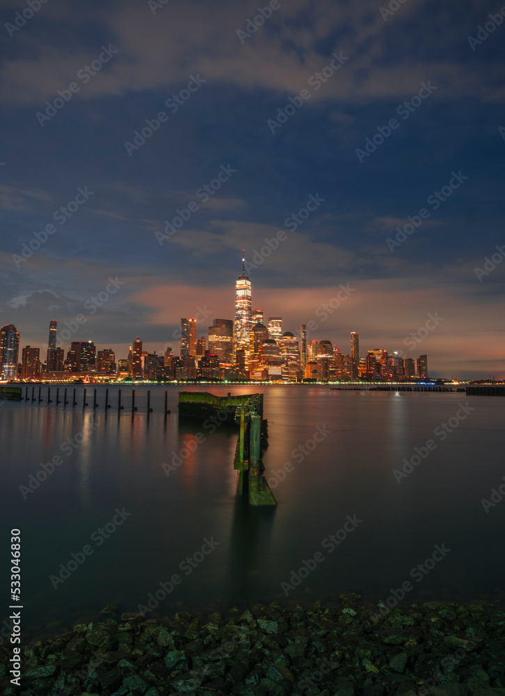 city skyline at night beautiful colors sky water New York Manhattan sunrise 