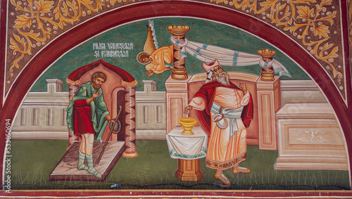 Photo An icon representing the parable of the tax collector and the Pharisee at the Sa