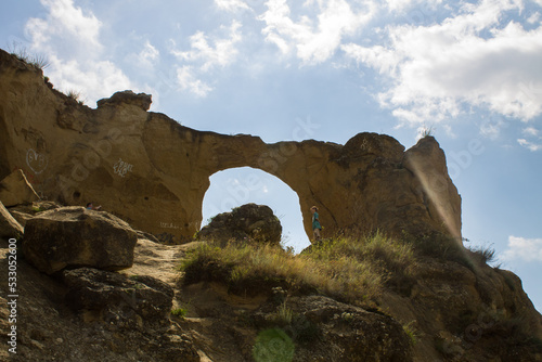 A large stone rock with a round hole - Mount ring in Kislovodsk Russia on a sunny summer day and a space for copying