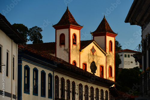 The sunset-lit facade of the Church of Our Lady of Carmo in the historic small town of Serro, a remote colonial gem near Diamantina, Minas Gerais state, Brazil photo
