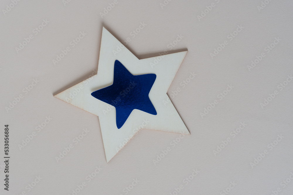 paper and wood stars on blank paper paper and wood stars on blank paper