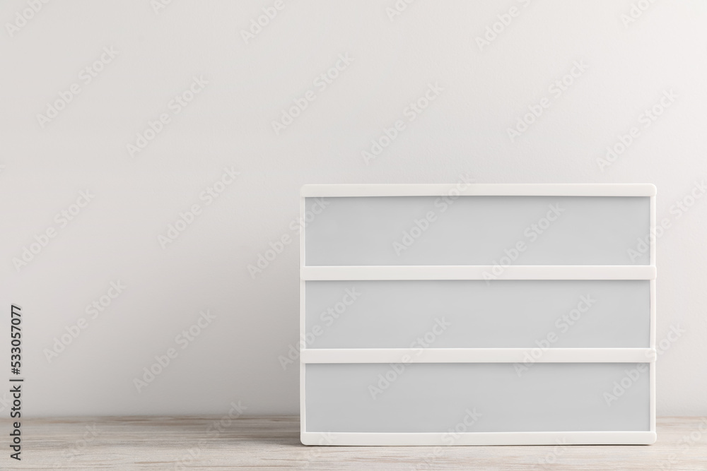 Blank letter board on wooden table. Space for text Blank letter board on wooden table. Space for text