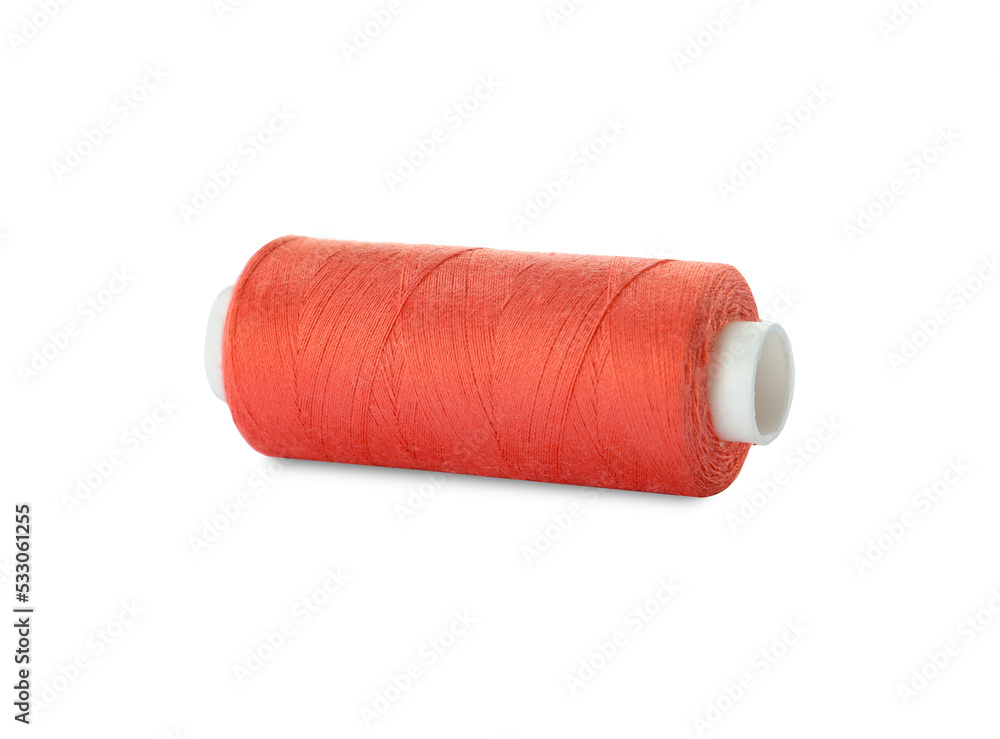 Spool of coral sewing thread isolated on white Spool of coral sewing thread isolated on white