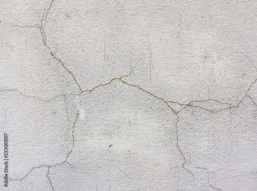 Cracked concrete texture closeup background