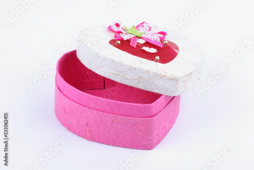 Pink heart gift boxes on white background