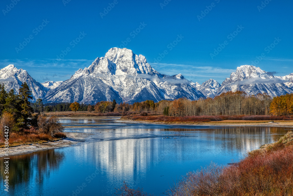 Snake river with the snow-covered Grand Teton mountains.