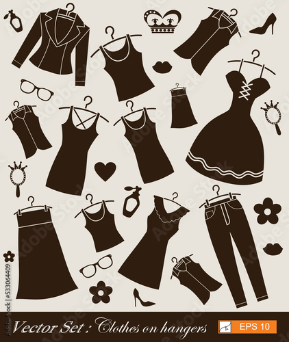 vector set ,Hand drawn clothes on hangers, vector illustration 