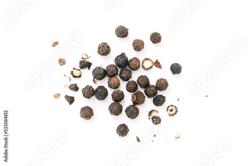 Dry black pepper Black pepper or peppercorns with broken isolated on white background , top view , flat lay.