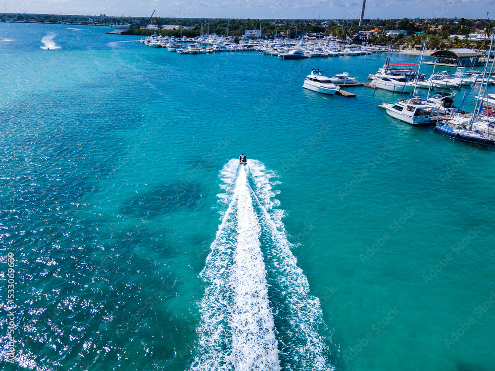 Beautiful aerial view Jet sky water sports in the Turquoise Caribbean waters of Boca chica Dominican Republic