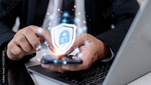 Cyber security. Data protection concept. Banking security. Hands touching digital icon padlock and network connection on mobile smartphone, virtual interface screen.