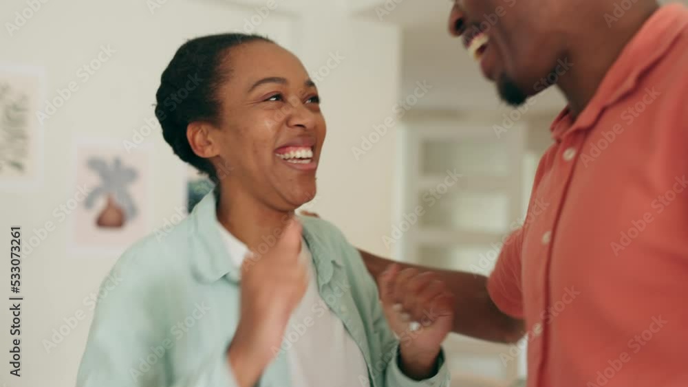 Excited black couple, love and dancing at home for love, care and funny weekend day together. Happy, smile and laughing black woman, african man and crazy young people dance to relax in living room Excited black couple, love and dancing at home for love, care and funny weekend day together. Happy, smile and laughing black woman, african man and crazy young people dance to relax in living room