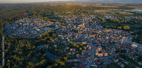 Aerial view around the old town of the city Soufflenheim in France on a late sunny afternoon on summer.