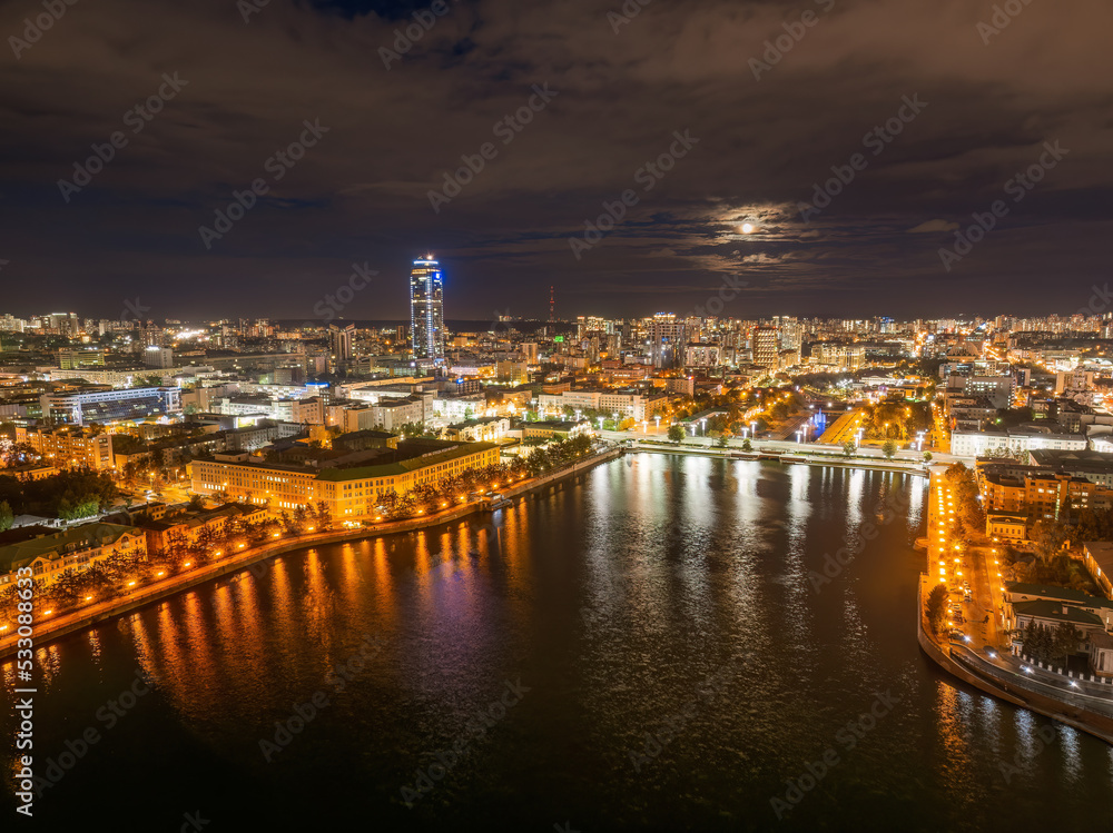 Embankment of the central pond and Plotinka in Yekaterinburg at summer or early autumn night. The historic center of the city of Yekaterinburg, Russia, Aerial View