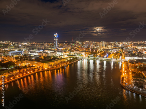 Embankment of the central pond and Plotinka in Yekaterinburg at summer or early autumn night. The historic center of the city of Yekaterinburg, Russia, Aerial View © Dmitrii Potashkin