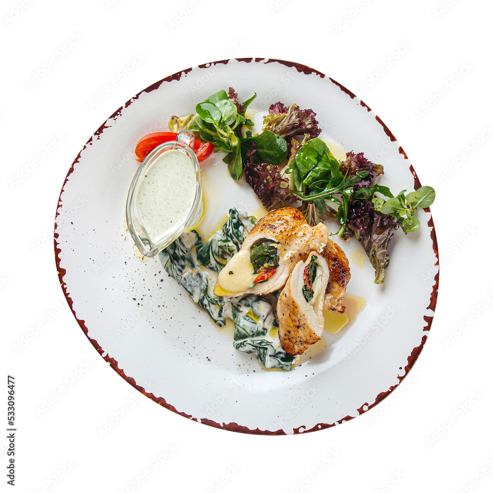 Portion of chicken breast stuffed with spinach Portion of chicken breast stuffed with spinach