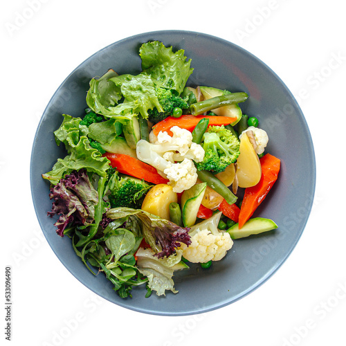 Bowl of steamed vegetables and greens